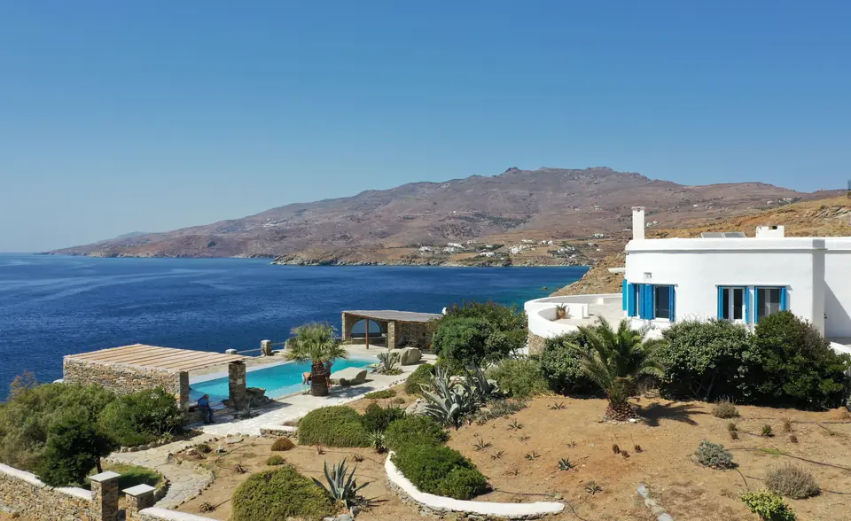 Villa Akrivi from above, with the pool, the garden and the Aegean
